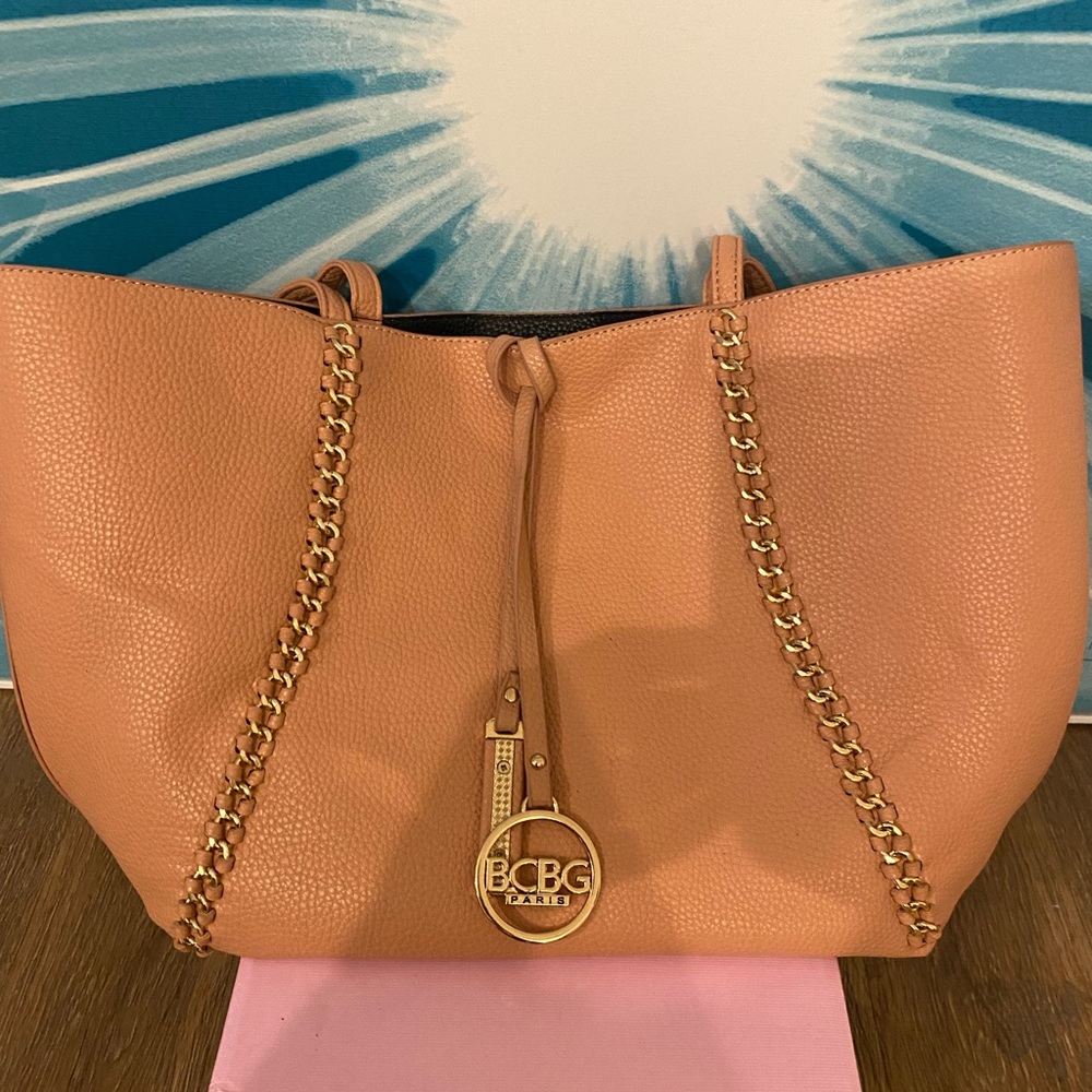 BCBG peach bag with gold chain accents